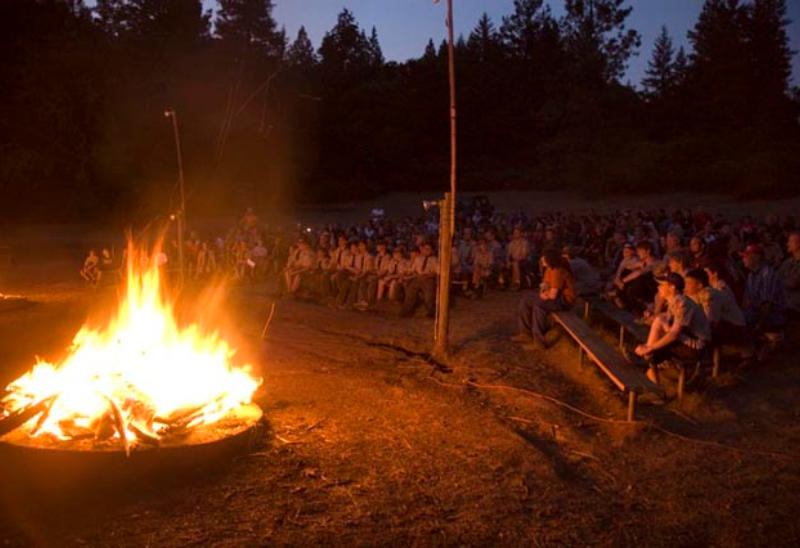 View from right of stage looking through the fire out to the Campers.